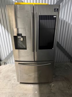 Samsung Refrigerator with tablet in great condition.