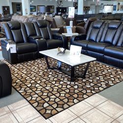 Caveman Den Power Reclining Sofa and Loveseat Set