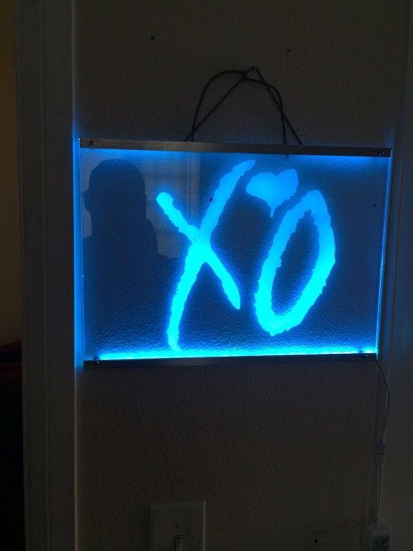 The Weeknd XO logo display