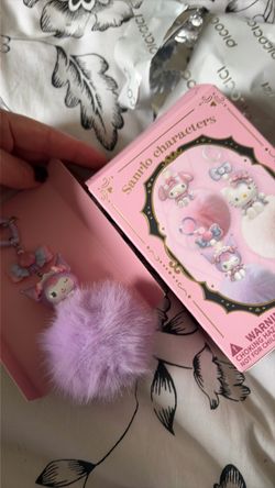 Hello kitty and friends kuromi puff ball keychain
