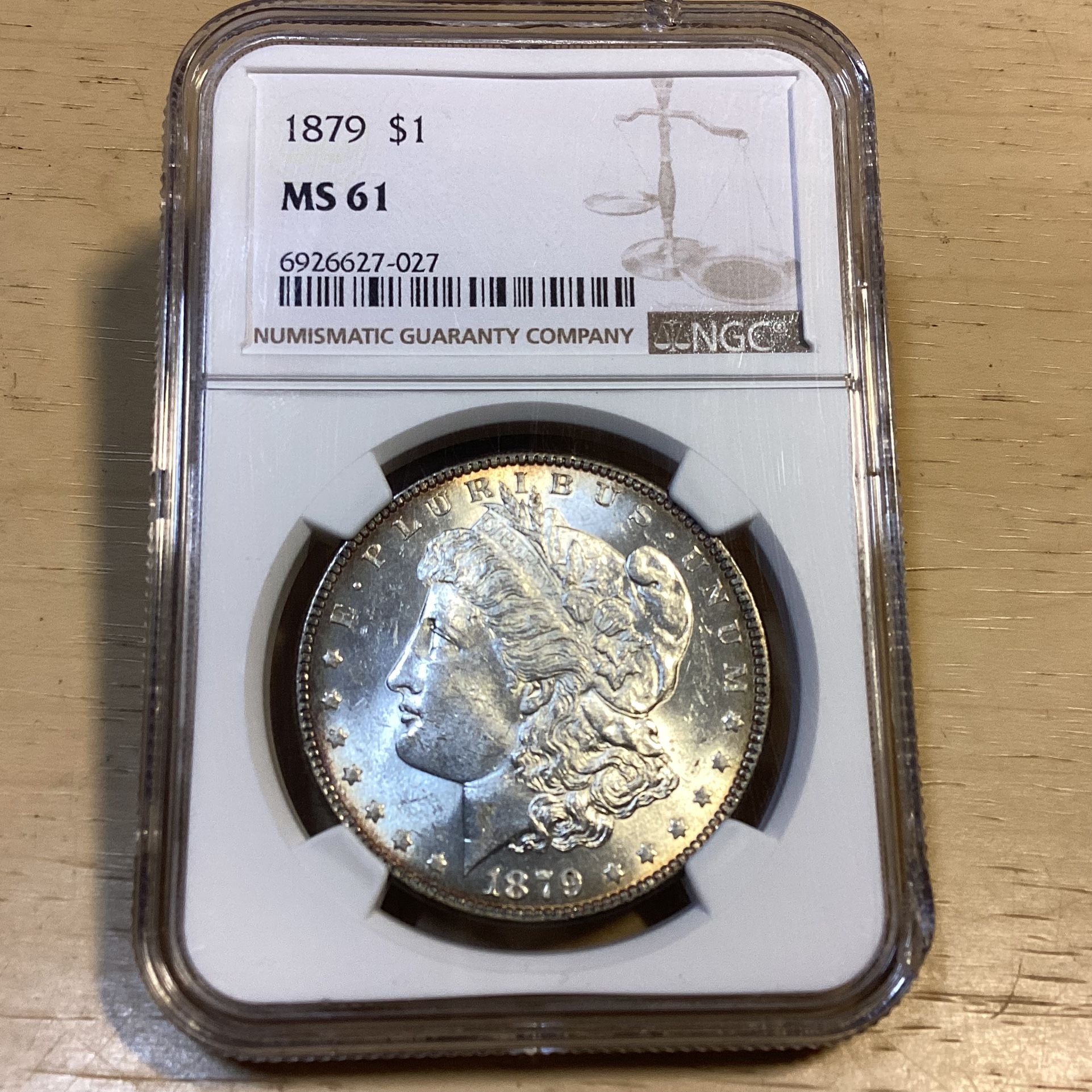 Graded 1879 P Morgan Silver Dollar