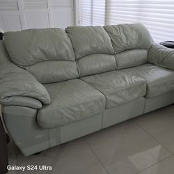 3-seater sofa bed in green leather