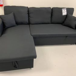 Brand New sectional sofa with chaise storage and pull out bed!  Gray and black available   
