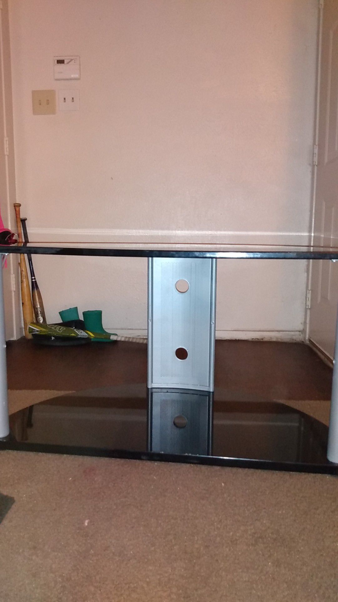 Black tv stand holds up to 50" Excellent condition Asking $20