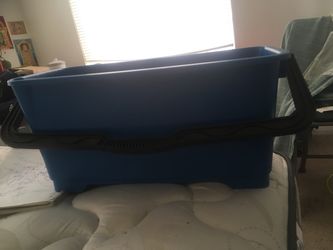Blue storage box with handle