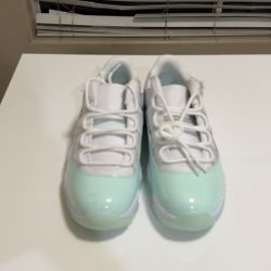 teal women’s jordan 11 low size 9