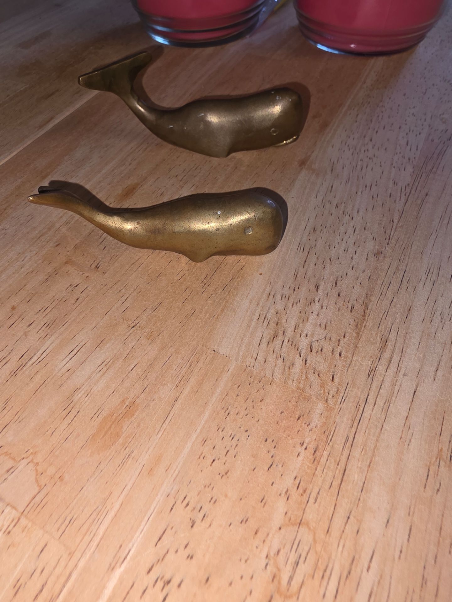 Vintage brass whales