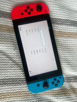 Nintendo Switch with Neon Red and Blue Joy-Cons