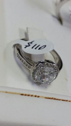 .925 sterling silver with genuine cubic zirconia diamonds..size 8