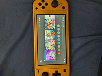 Nintendo switch lite gold zelda edition