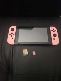 Nintendo switch with pink controllers + 256gb san disk ultra