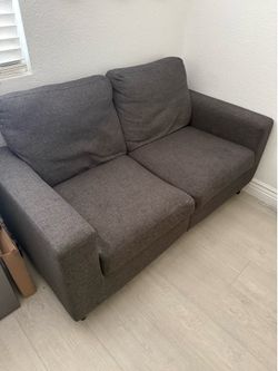 Gray loveseat couch