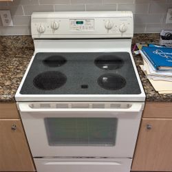 Refrigerator Freezer Combo And Four Burner Electric Stove