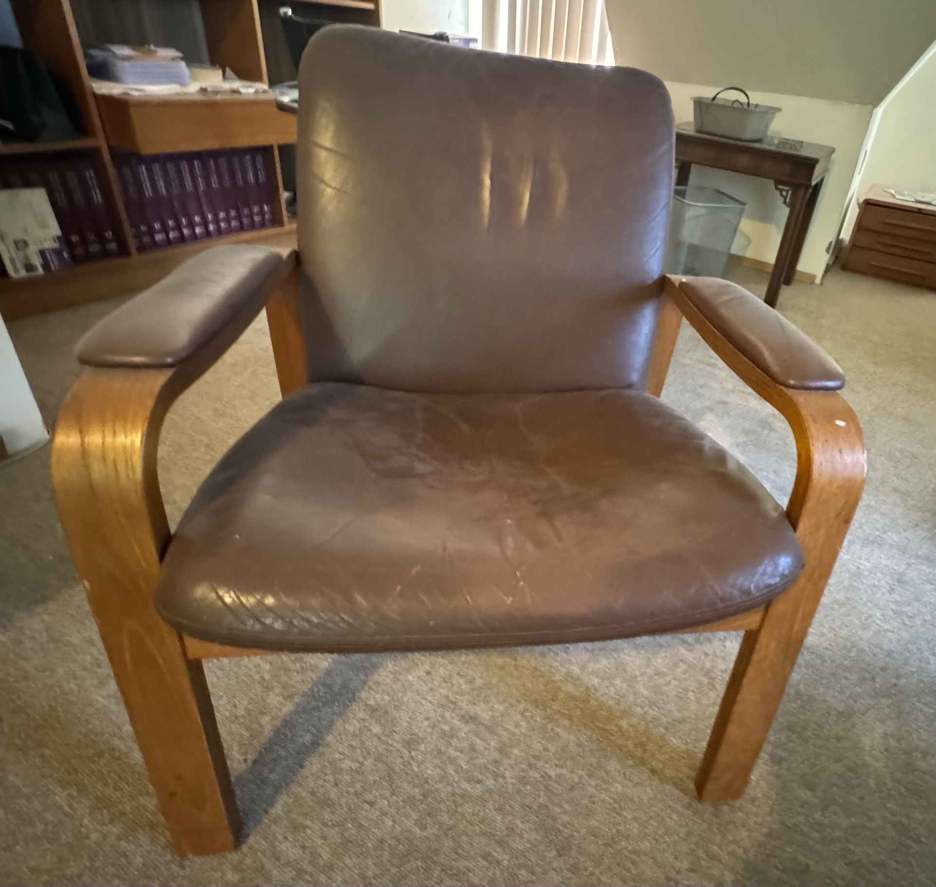 Two Ekornes mid century modern vintage leather Scandinavian teak lounge chairs