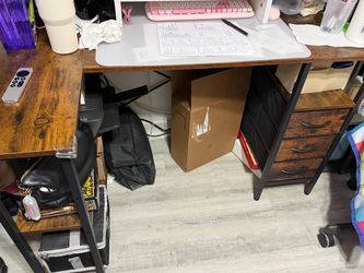 L- shape desk with drawers and shelves