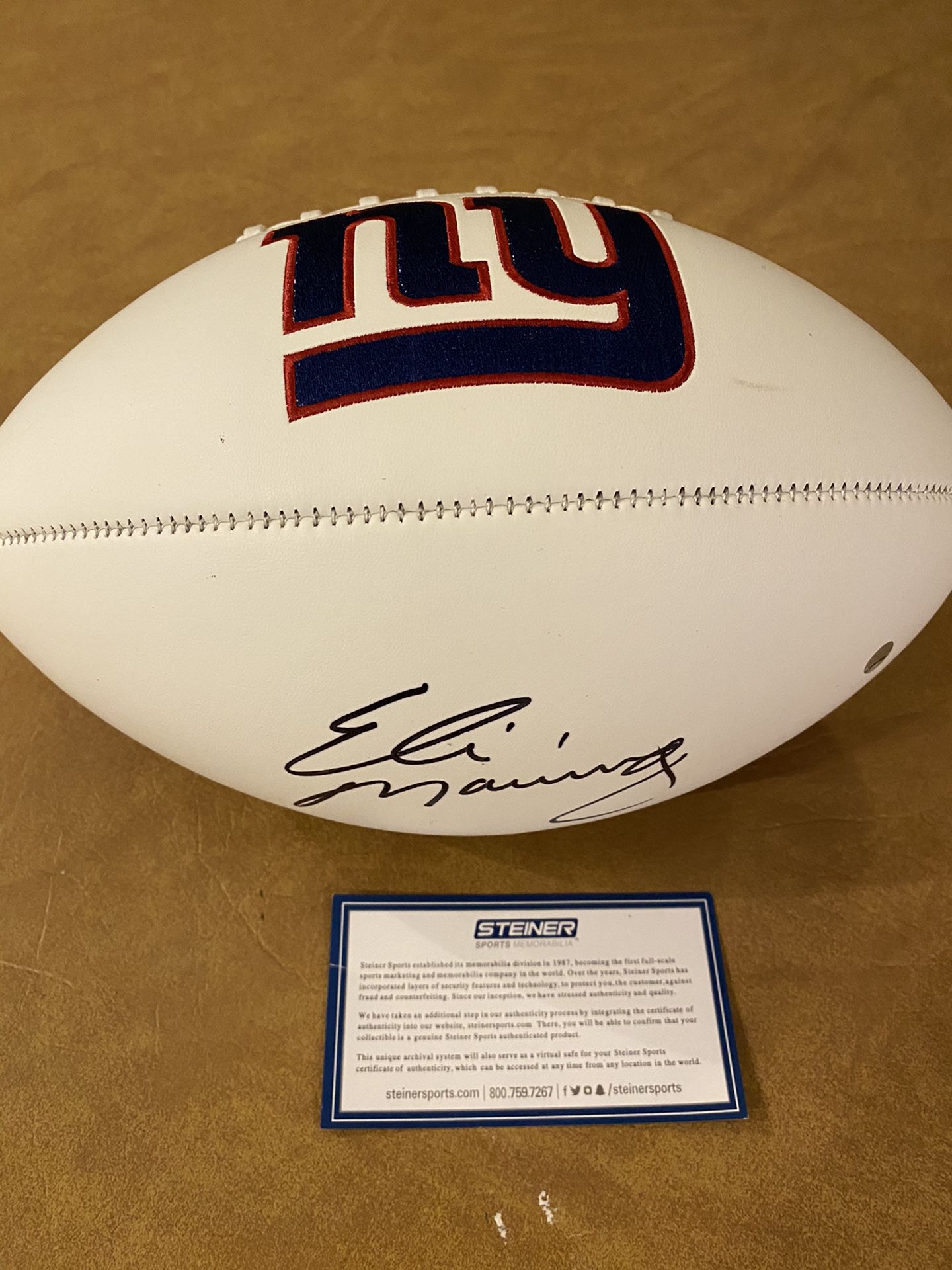 Eli manning autographed football