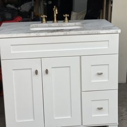 Carrara stone top white sink white bathroom vanity like new includes gold faucet 37”L 23”D 36”H