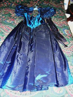 Beautiful woman's blue sheen prom bridesmaid dress