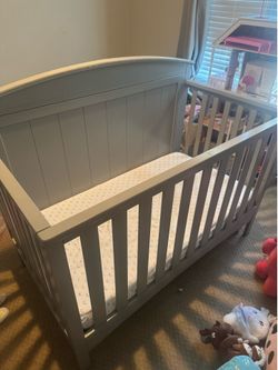 Gray delta crib