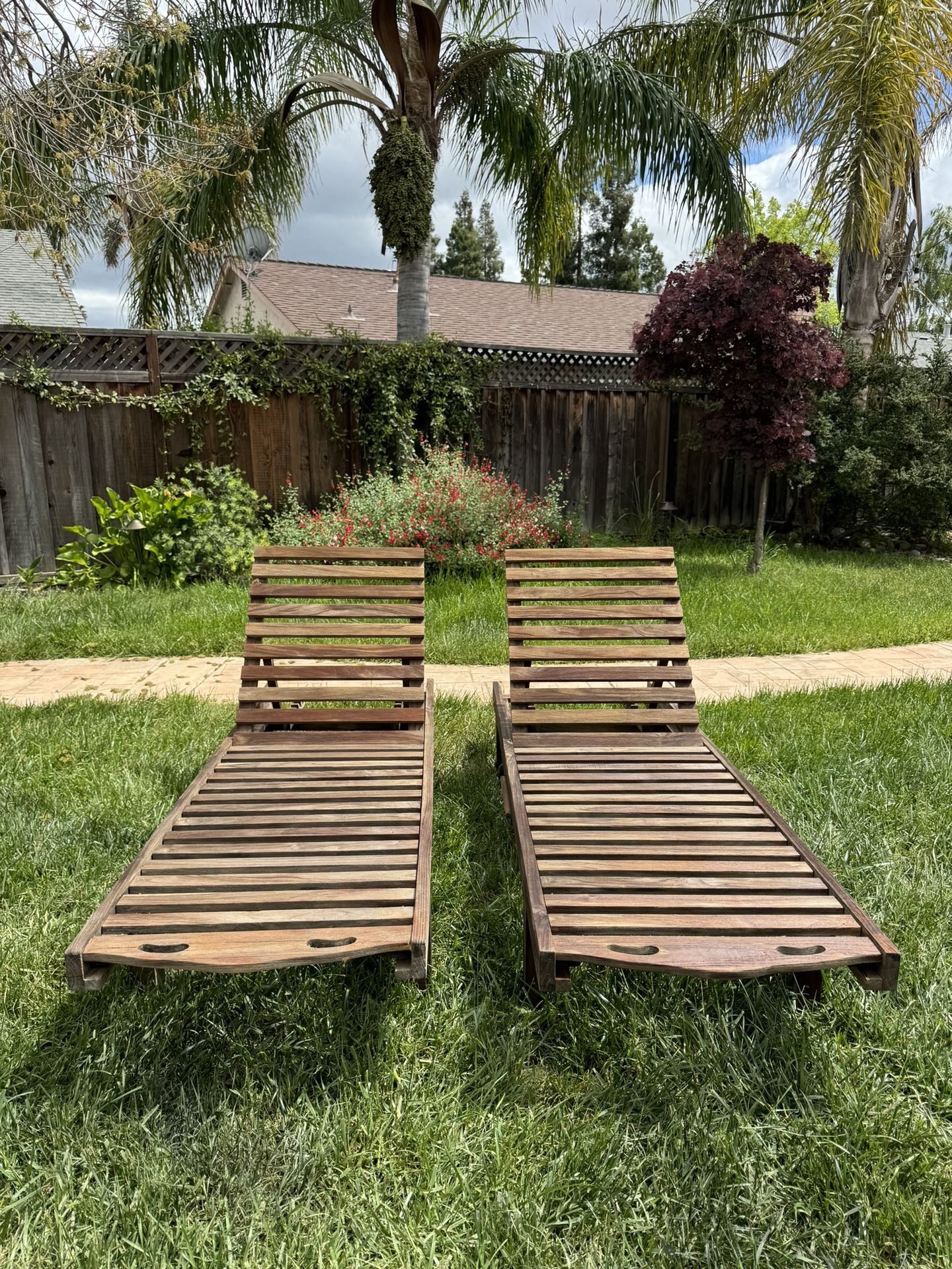 2 teak outdoor chaise loungers 