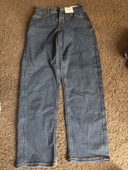 Mid-rise, baggy jeans
