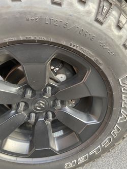 SET OF TIRES AND RIMS FOR RAM IN PRETTY GOOD CONDITIONING
