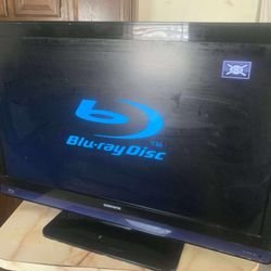Old School Flat Screen Tv 45”-50” With A Built In Blueray DVD Player Into It