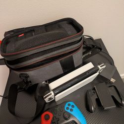 Nintendo switch OLED with Animal Crossing and accessories