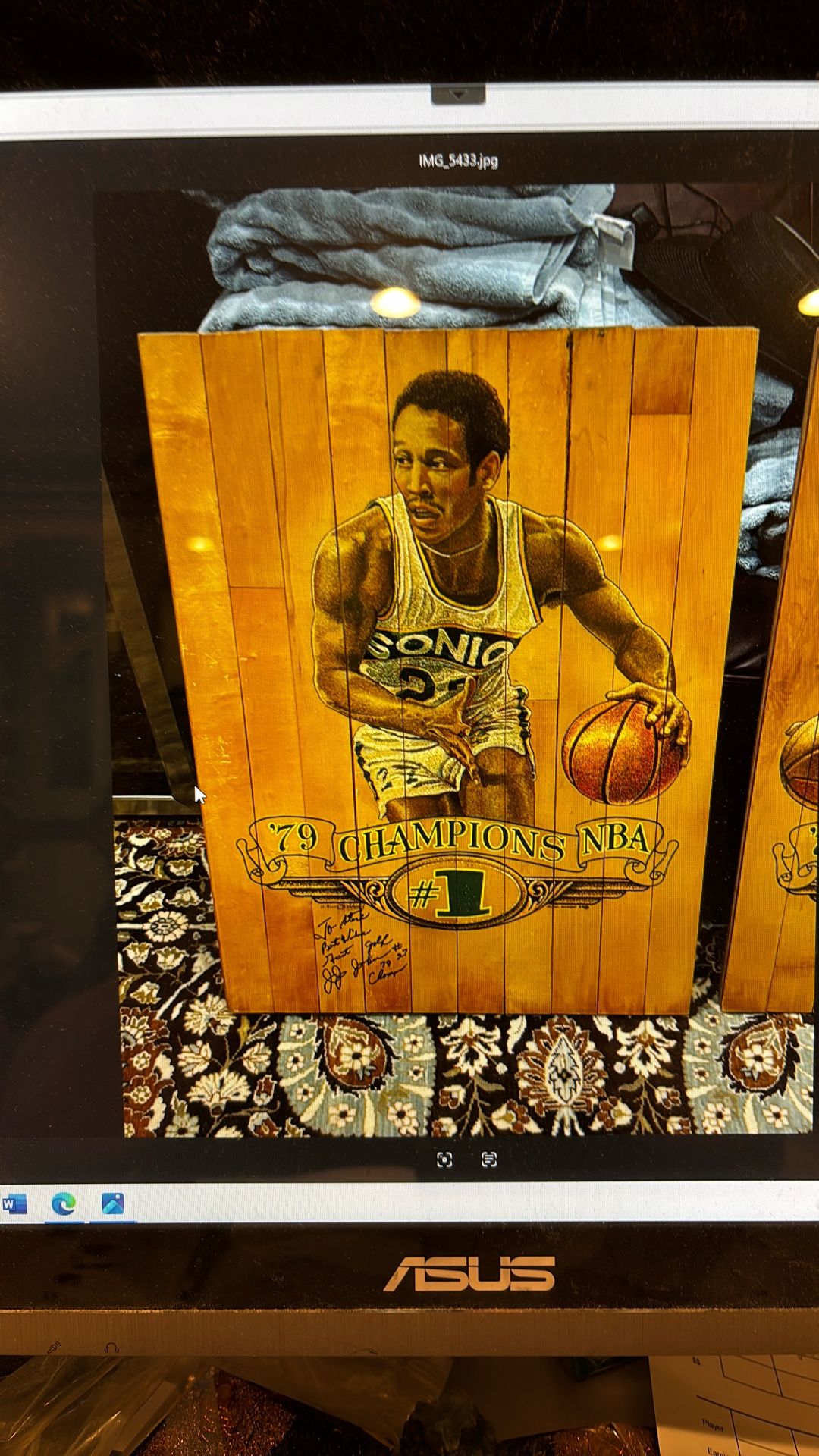 John Johnson 1979 NBA champions artwork on Coliseum floor