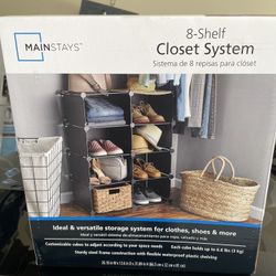 8 Shelf closet system BRAND NEW IN BOX!