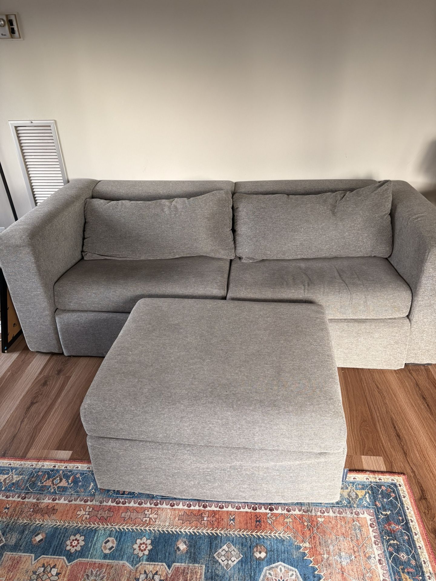 Gently Used Elephant in a Box Sofa & Ottoman