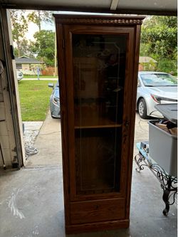 Vintage wooden gun cabinet