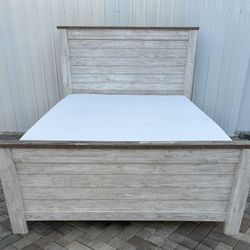 Beautiful Queen size bed from Ashley Furniture. Mattress included free. Delivery available for an additional cost. 