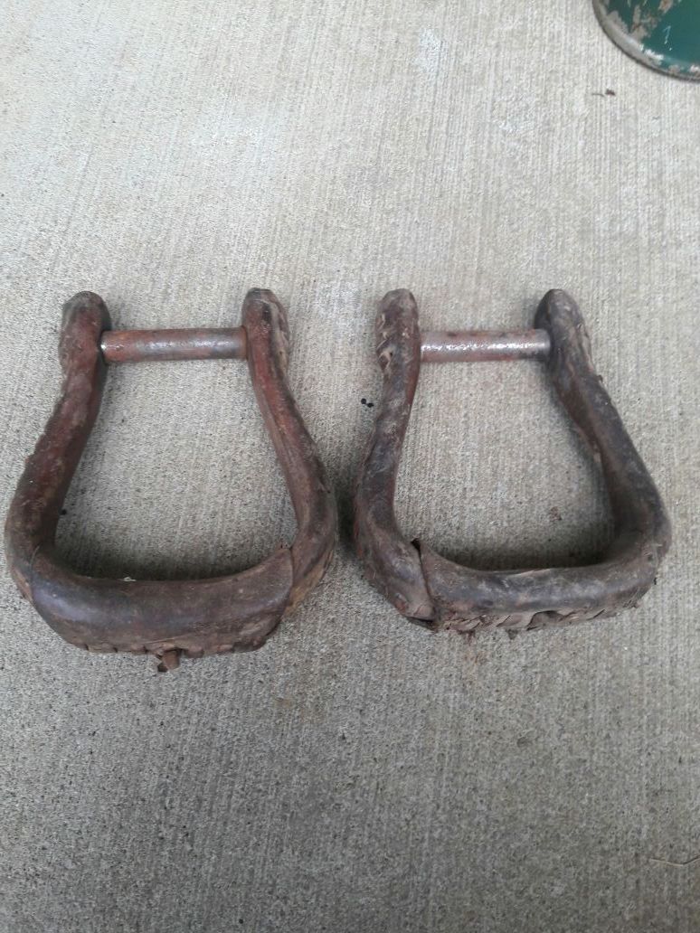 Vintage saddle stirrups good condition nice leather sticking