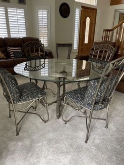Beautiful Iron and Glass Dinning Table $200