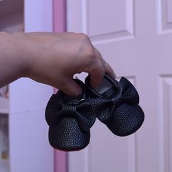 Baby red bottom shoes.