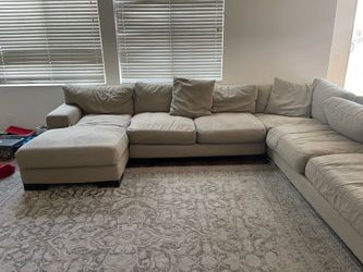 Sectional couch with pillows
