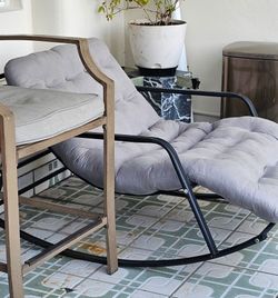 Outdoor Lounge Chair with Gray Tufted Cushion. Pre-owned