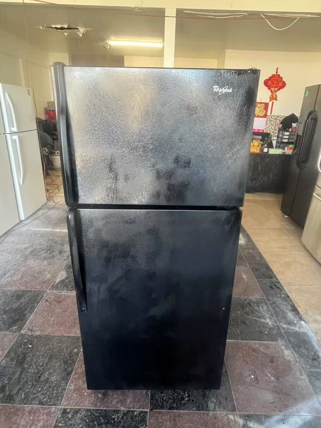 Used Whirlpool black refrigerator