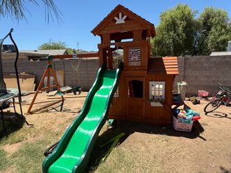 Playhouse with swing