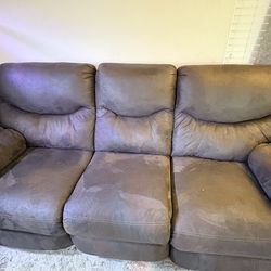 Reclining Faux leather sofa and love seat