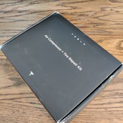 Tesla Air Compressor And Tire Repair Kit