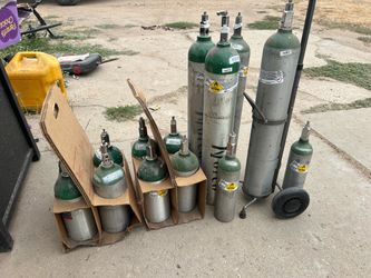 Lot of Medical Oxygen Cylinders with Cart