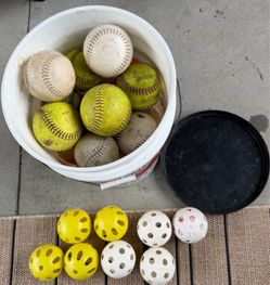 Softball 🥎 bucket balls hard balls lot