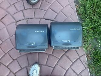 Electric paper towel dispensers