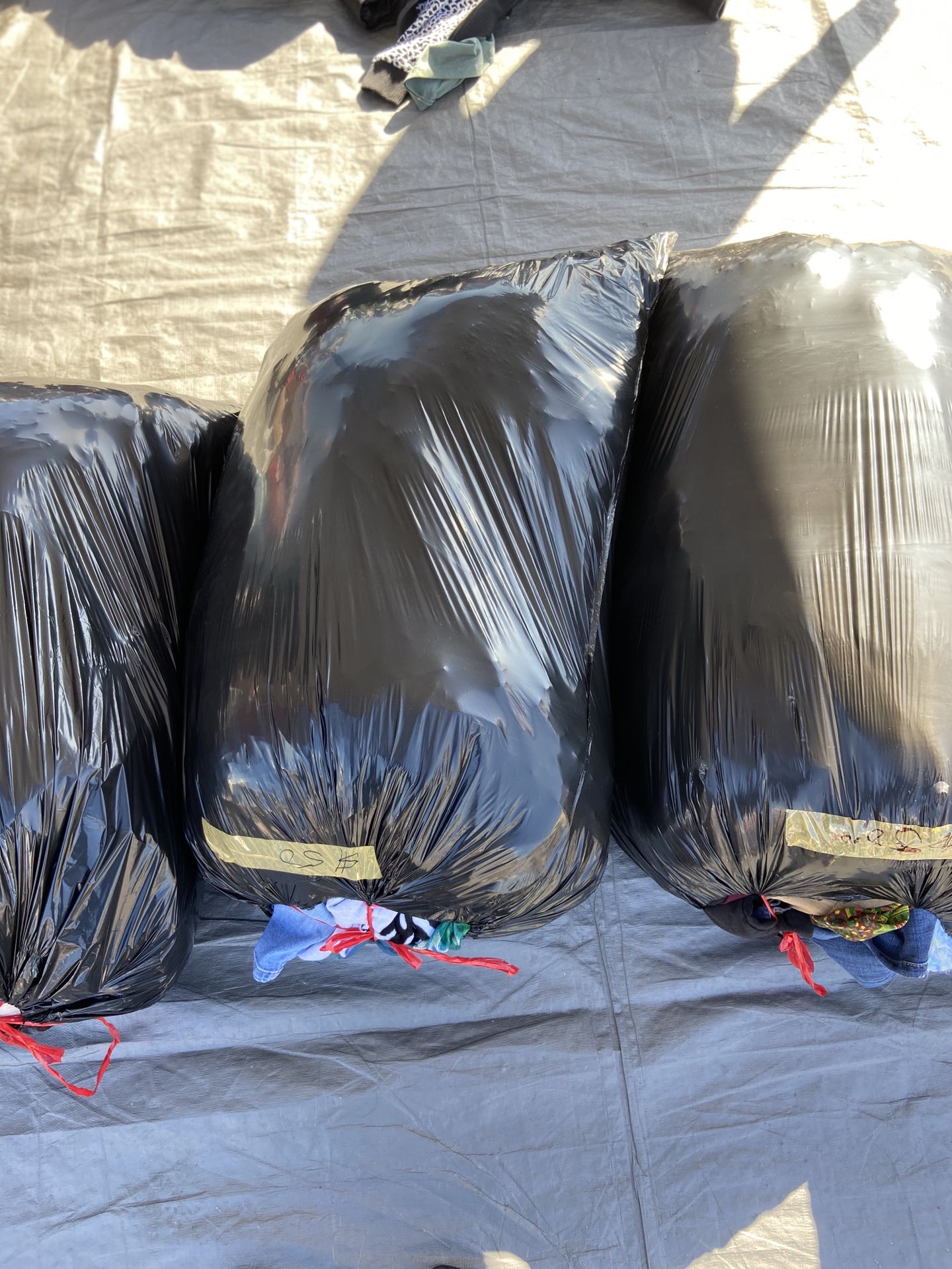 2 Large Trash Bags Of Clothes Size Large Xl for Sale in El Paso, TX -  OfferUp