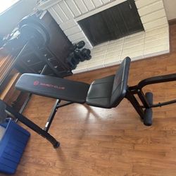 Adjustable bench with barbells and weights for sale