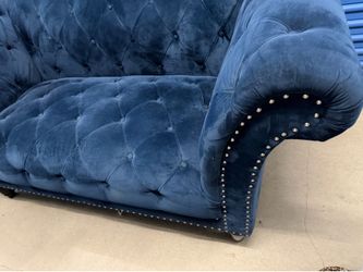 Blue sofa and loveseat