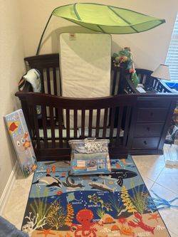 Verona crib, changer, mattress, lamp, carpet, toy, comforter and sheets, leave umbrella decor.