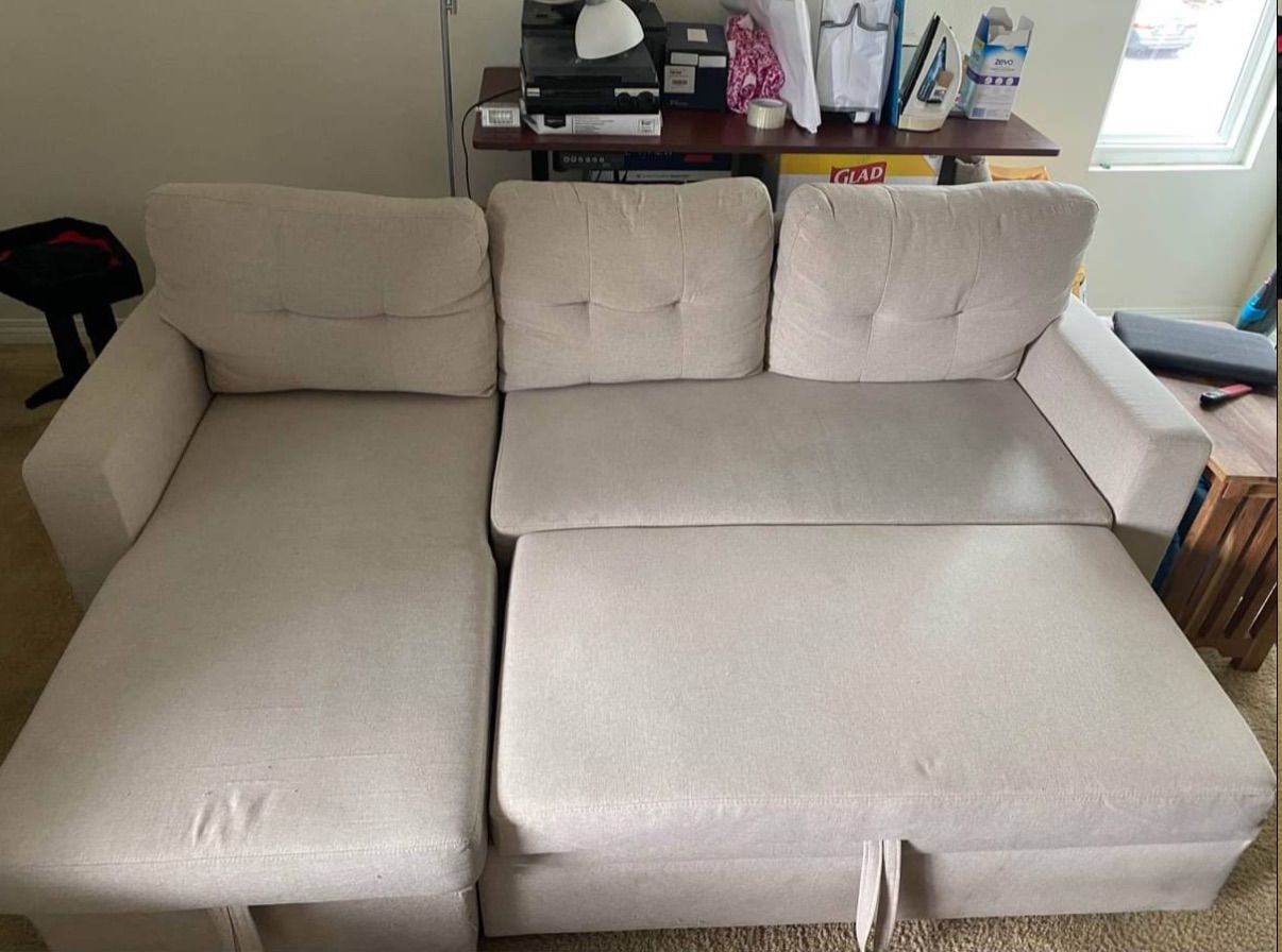 Light Beige Sectional Sofa with Sleeper & Reversible Chaise